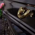 casket with gold handle