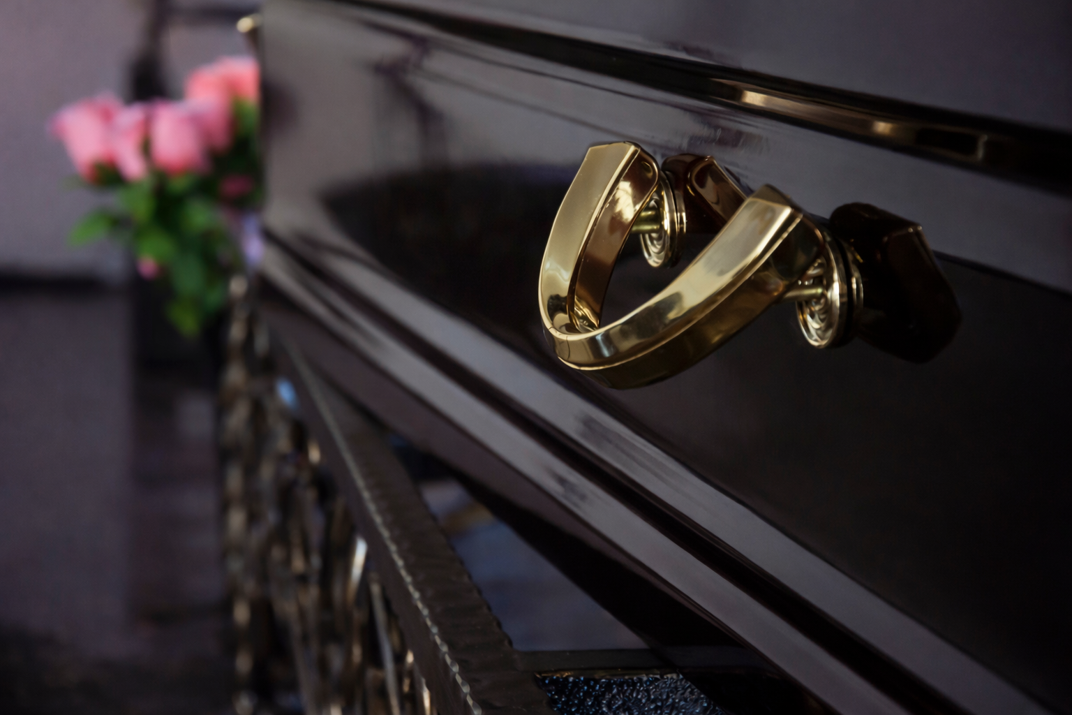 casket with gold handle
